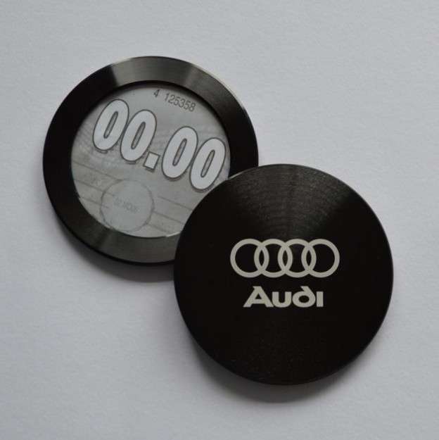 Product branding on Tax disks using lasers