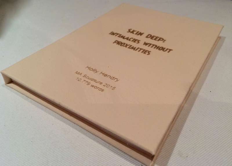 Photo of laser marked Thesis of a student
